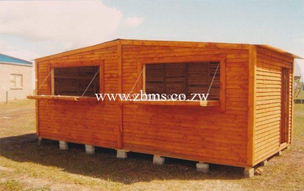 3m by 6m wooden-wendy tuck shop kiosk with two serving hatches for sale in harare zimbabwe
